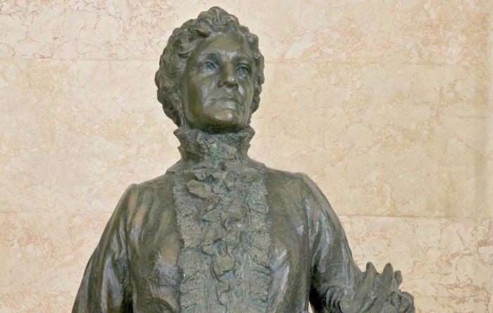 WY-EsterMorris-statue-closeup-USCapitol_FlickrPD_700 Ester Morris, first female Justice of the Peace in the U.S., Vice President of the National American Woman Suffrage Assoc., National Cowgirl Hall of…