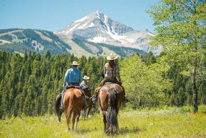 BigSkyChamber-horseride-LonePeak_LoneMountainRanch_courtesy_700 Lone Mountain Ranch horseback ride with a view of Lone Peak in Big Sky
