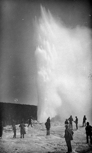 Old-Faithful-History-3_WikiPD_300x497 People standing at Old Faithful in the 1800's