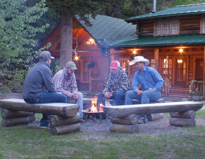 LodgesOfEastYellowstone-campfire_courtesy_700 Campfire at Shoshone Lodge & Guest Ranch of Lodges of East Yellowstone