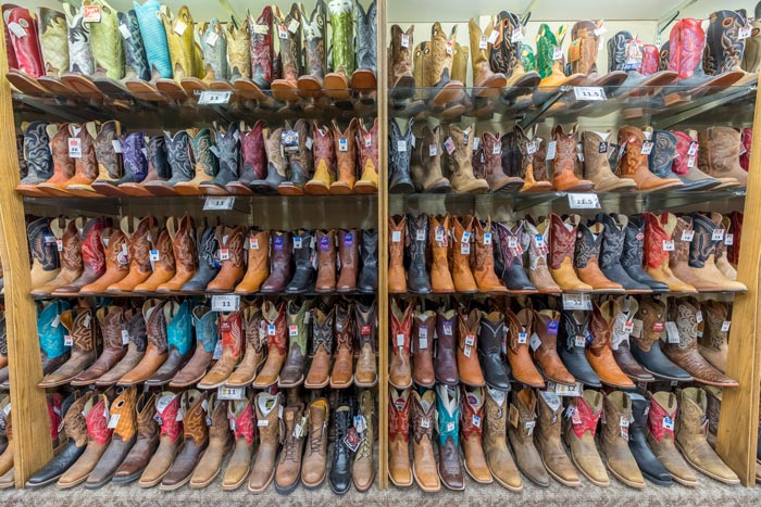 Casper-LouTalbertRanchOutfitters-boots_VisitCasper_700 Boot selection at Lou Talbert Ranch Outfitters in Casper, Wyo.