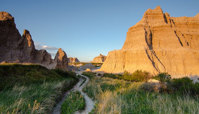 SD-Badlands-NP-grassy-meadow_Adobe_700 A grassy trail through Badlands National Park