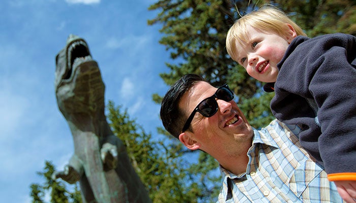 Laramie-Geology-ArloDino_ACTB_L_700 Outside of the Wyoming Geological Museum, a boy recognizes \