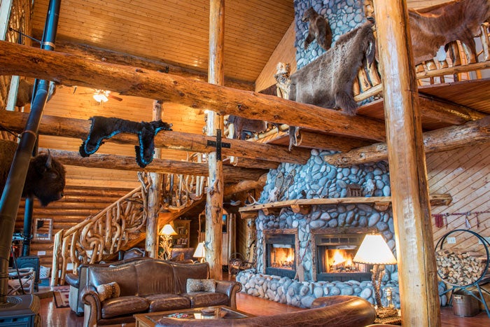 UnderCanvas-BarNRanch-winter-fireplace_courtesy_700 Lobby fireplace at Bar N Ranch near the West Entrance of Yellowstone