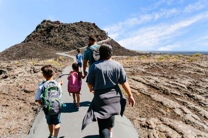 Family hiking in Craters of the Moon National Monument