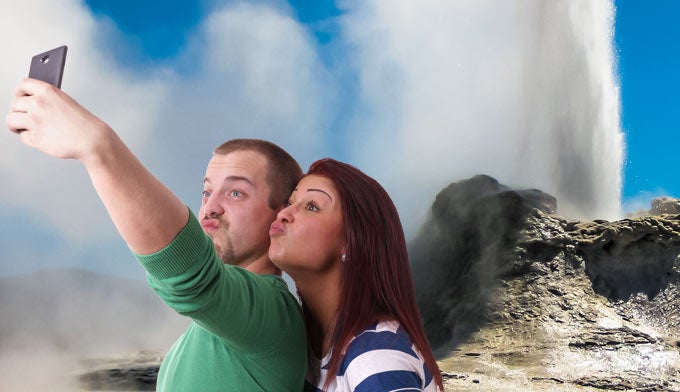 Bad-Selfie-Geyser_680 Couple taking a selfie next to a geyser.