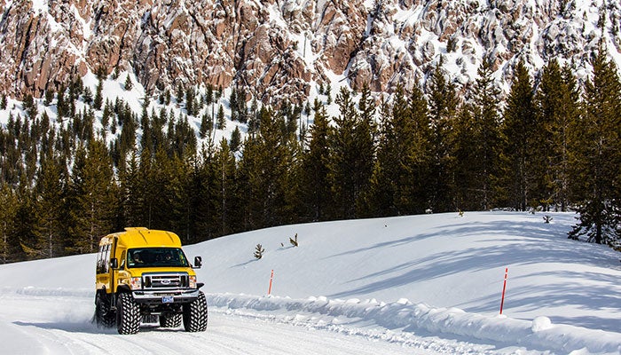 YS-snowcoach-TuffCliff_NPSJacobWFrank_700 Snowcoach near Tuff Cliff in Yellowstone