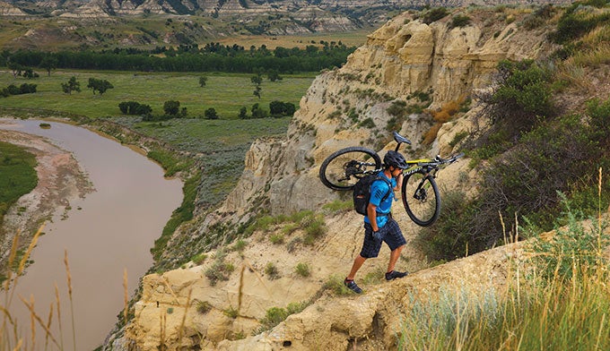 ND-TRooseveltNP-Maah-Daah-Hey-Trail_MedoraCVB_680 Mountain biker on the Maah Daah Hey Trail. Photo courtesy of Medora CVB