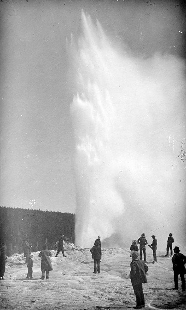 Old Faithful geyser historic photo