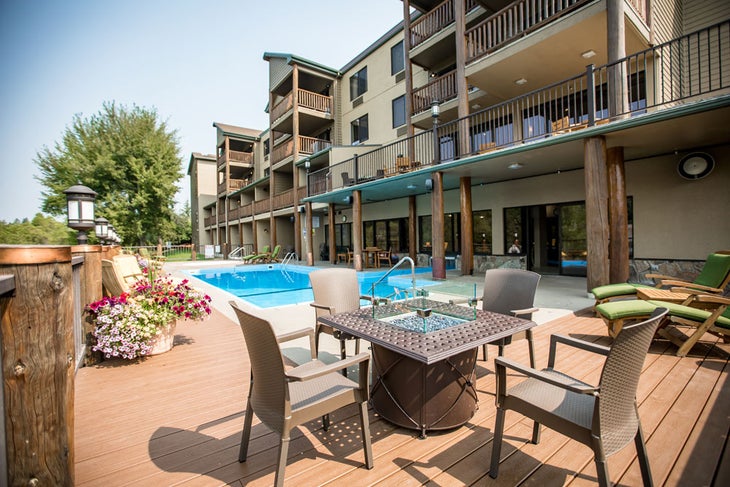 Enjoy the indoor-outdoor pool at The Pine Lodge