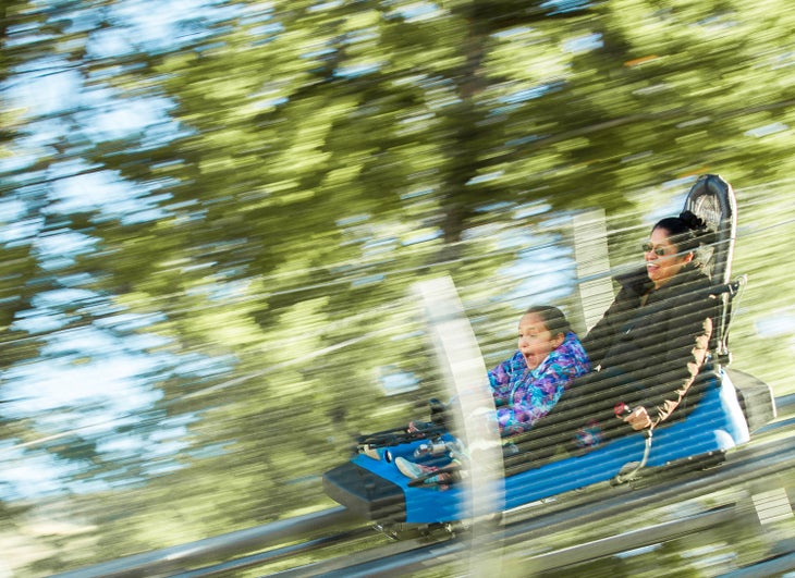 Mother and Daughter riding the Cowboy Coaster at Snow King Mountain Resort