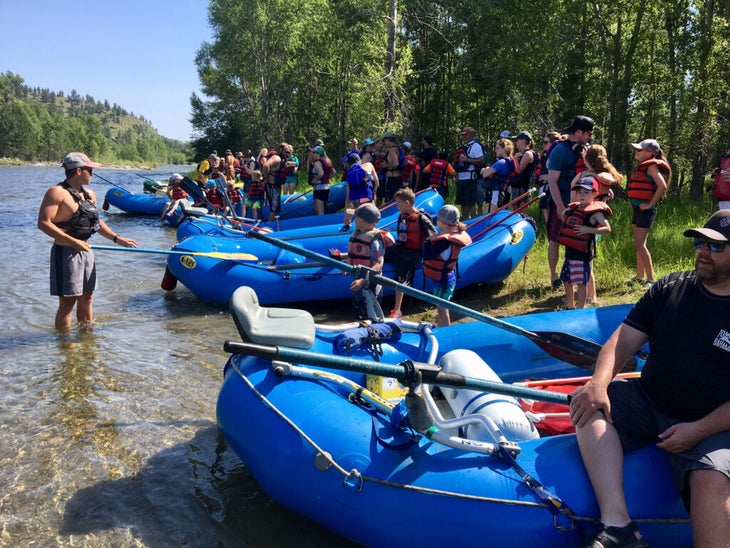Adventure Whitewater river guides give final instructions before departing down the river
